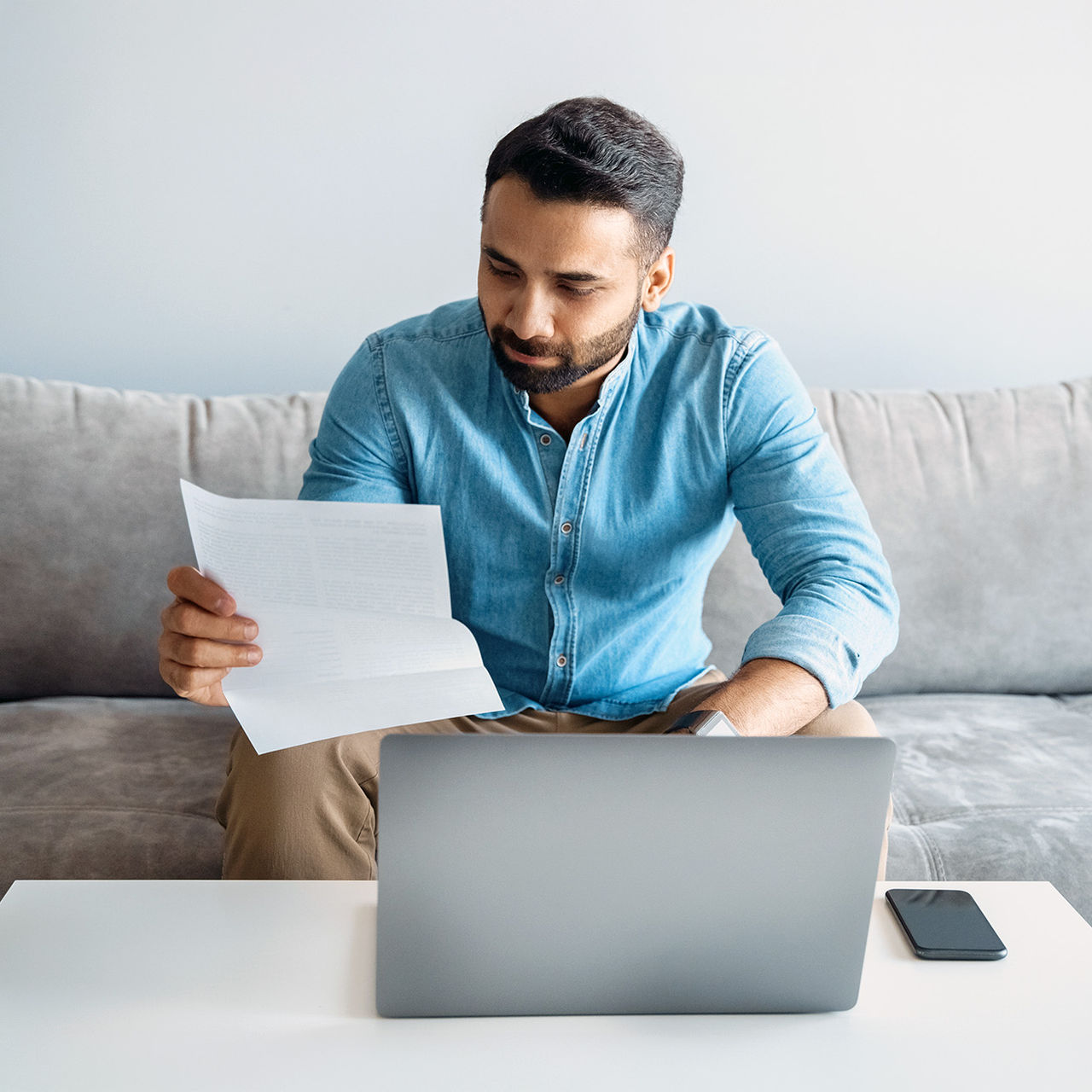 stock image person looking at device